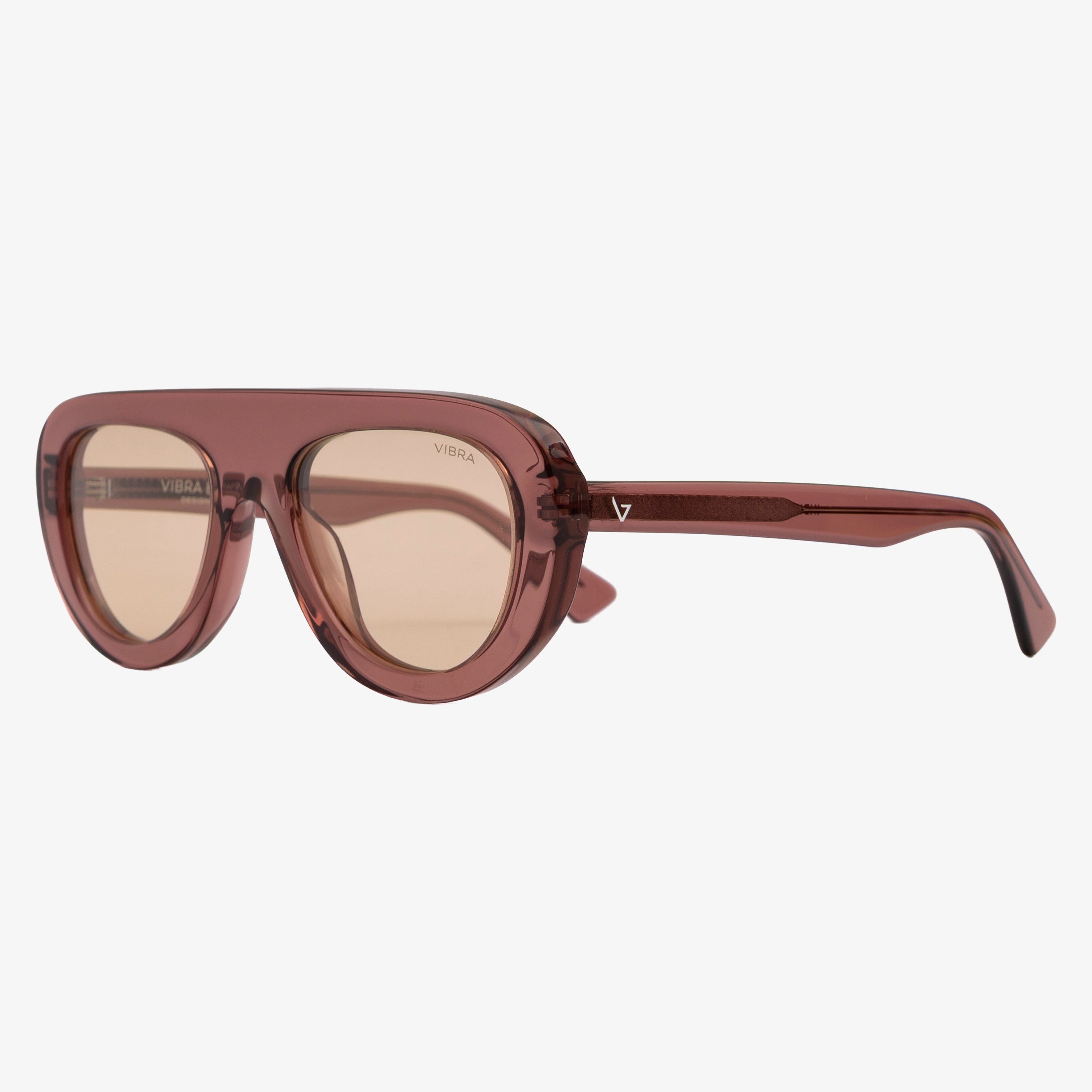 Occhiali da sole INDIRA, montatura rosa trasparente, lenti champagne, vista a tre quarti
