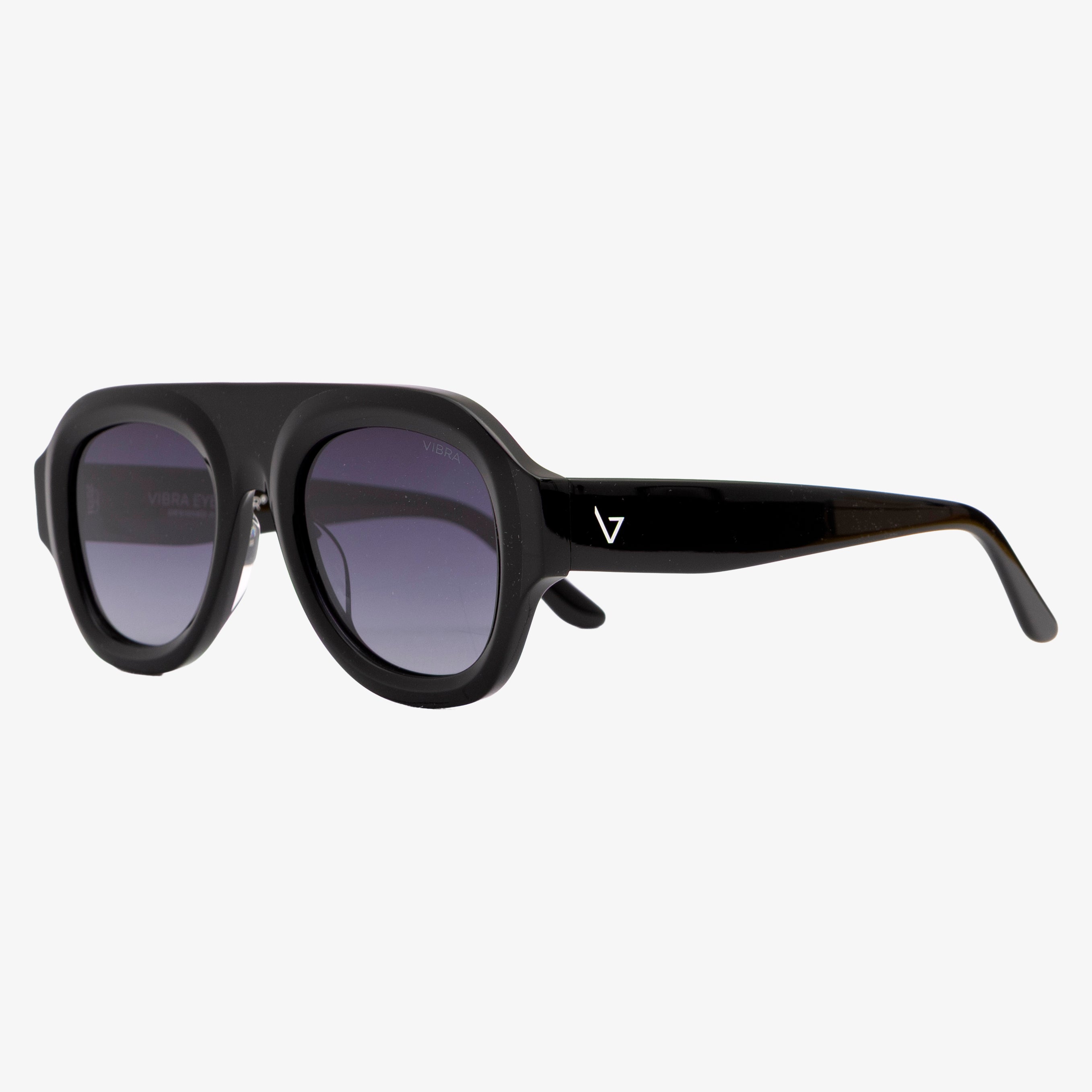 Occhiali da sole STUSSY, montatura nera, lenti grigie sfumate, vista a tre quarti